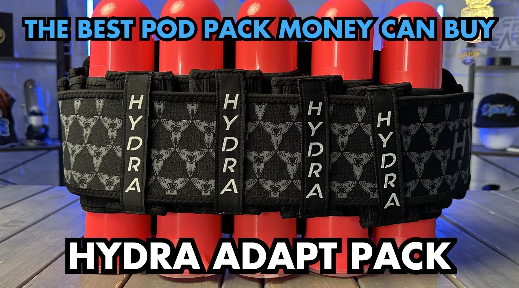 Hydra Adapt paintball harness with strapless pod retention, lumbar support, and low-profile tournament design for competitive players.