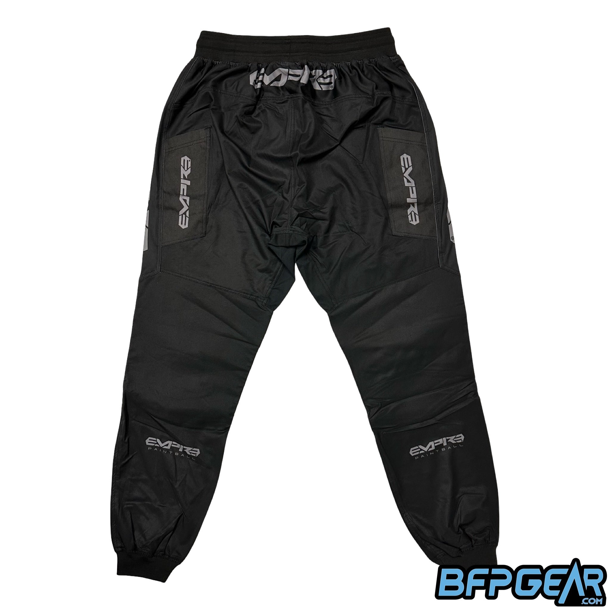 The back of the black and grey Empire CMDR Paintball joggers.