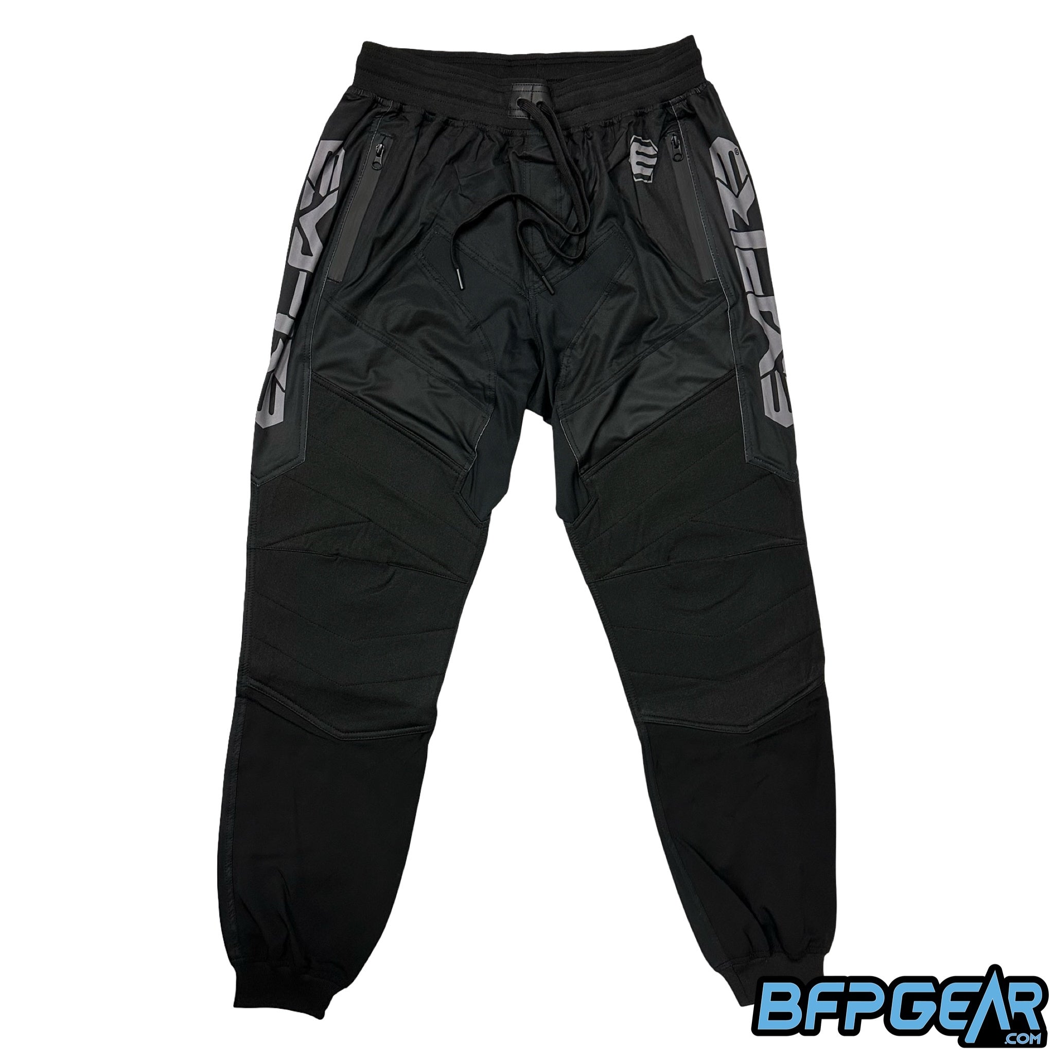 The front of the black and grey Empire CMDR Paintball joggers.
