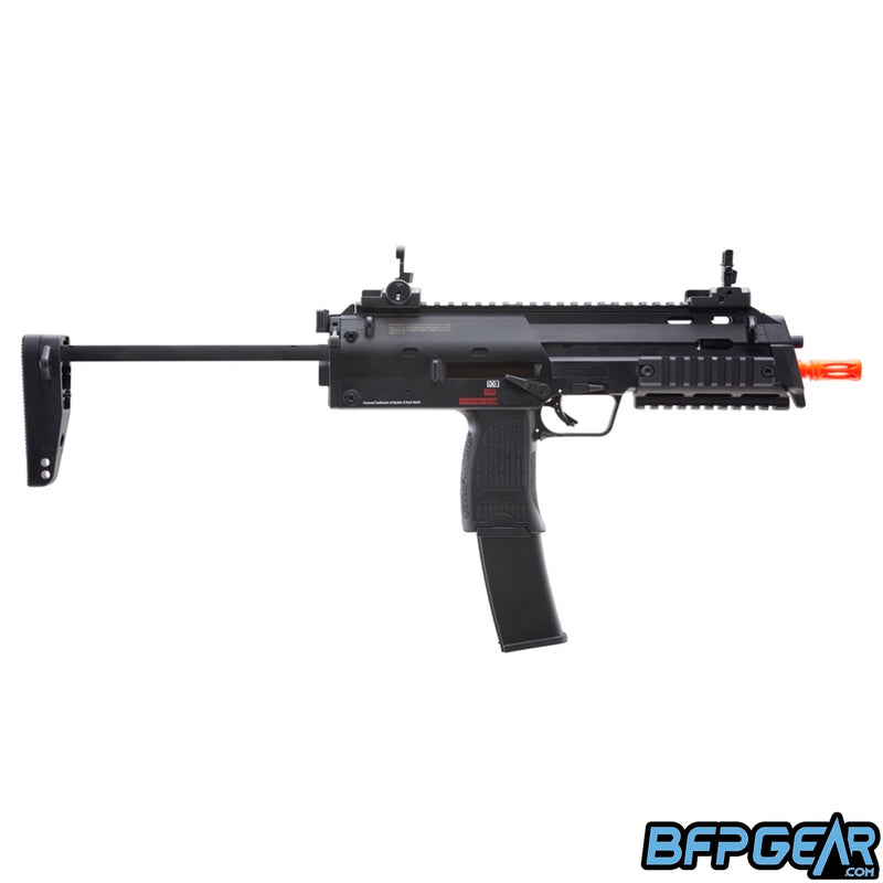 The H&K MP7 Navy gas blow back airsoft sub machine gun in black. The stock expands and retracts.