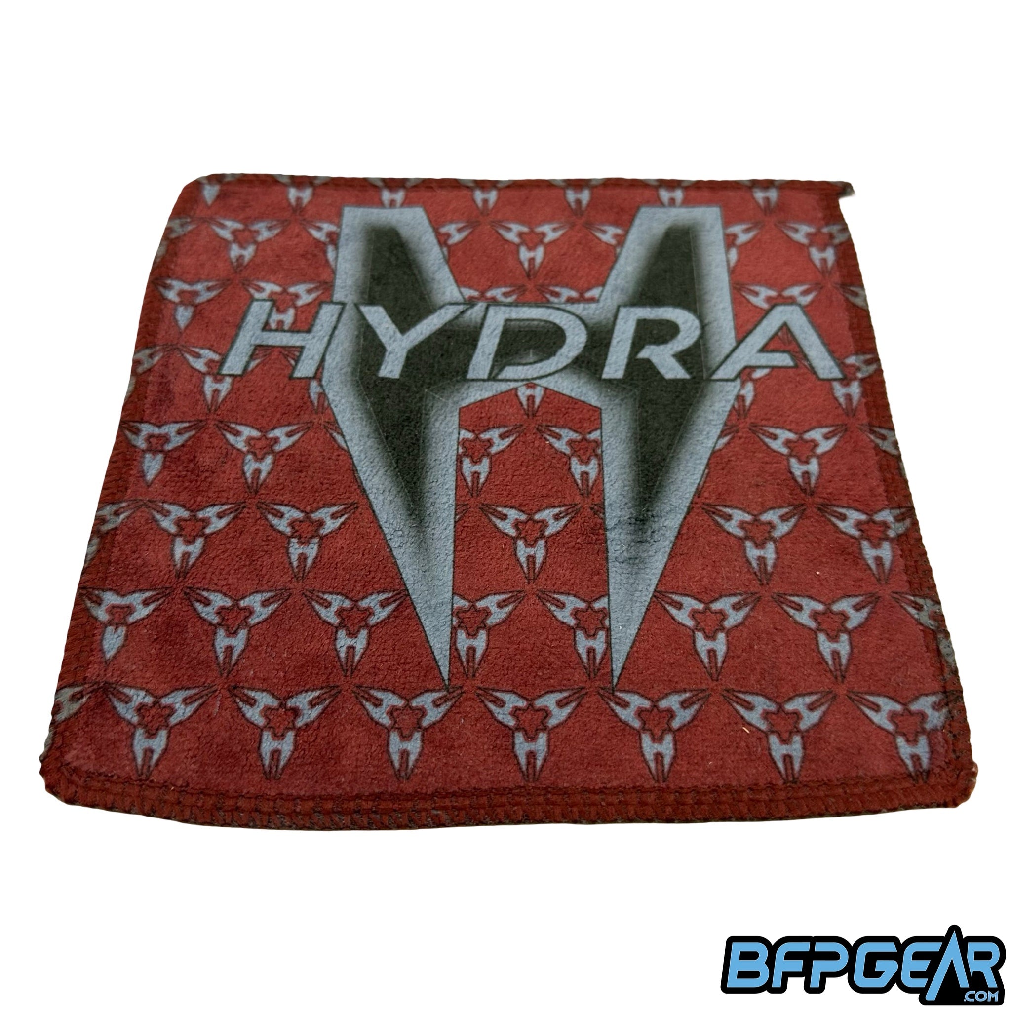 Pocket-sized Hydra microfiber cloth for paintball players. This microfiber is in the Hydra Red style.
