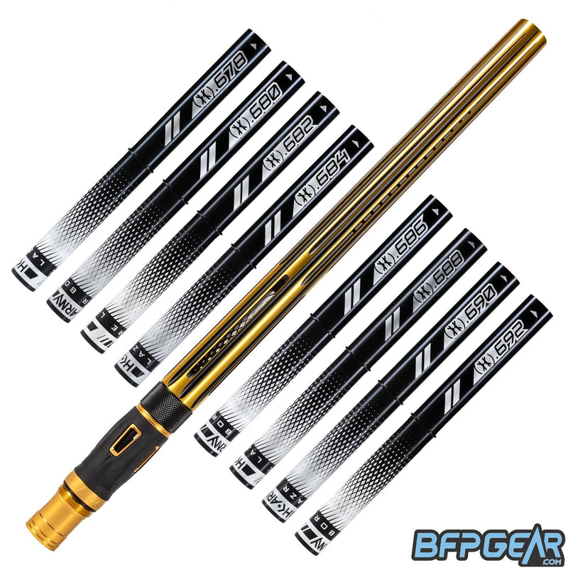 8 barrel inserts shown in black, as well as the Nova barrel. A straight, streamlined pattern with linear porting, the inlays are dust black, and the outside is gloss gold.