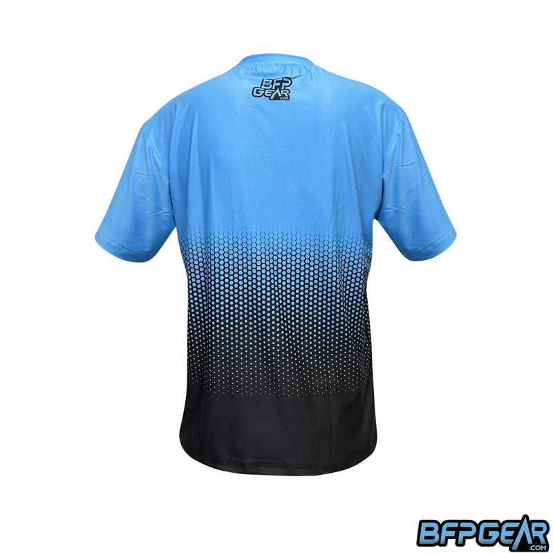 The back of the BFPGear Stretchy Soft shirt. Light blue to black fade with a hexagonal pattern. The BFPGear logo is at the nape of the neck.