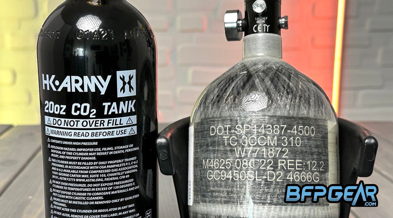 Pictured here are a CO2 tank and High Pressure Air tank with their hydro dates showing.