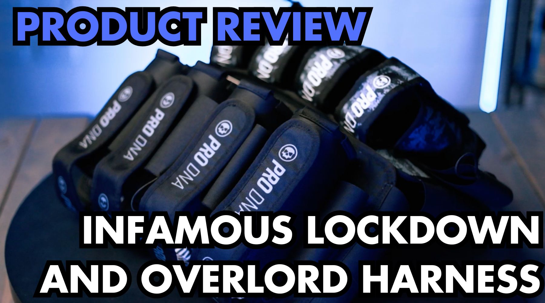 An image showing off the Infamous Paintball Lockdown Harness with text that reads 'Product Review Infamous Lockdown and Overlord Harness.'