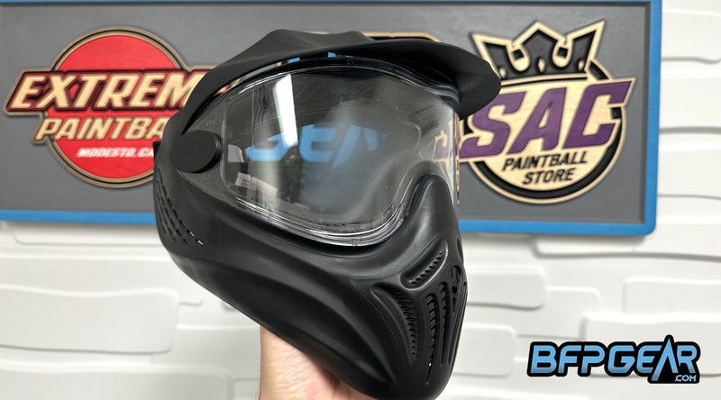 A photo of a paintball mask with the lens fogged up.