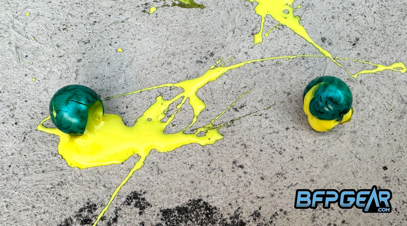 Pictured here are two broken Dynasty Paintballs. The left paintball is from a freshly opened bag, whereas the right paintball was in a freezer for four days. The fill is much thicker when colder, and the shell is extremely brittle.