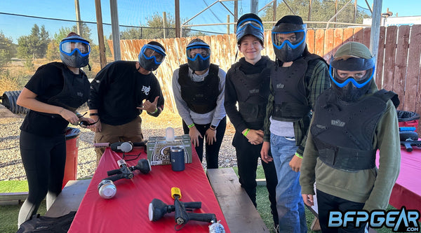 Pictured here is a low impact party. Six players in their proper safety gear, getting ready for another game!