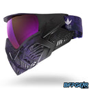Left facing view of the Bunkerkings CMD goggle in Purple Black highlander. The Highlander camo pattern fades to black towards the ears of the goggle, and comes with a matching strap.