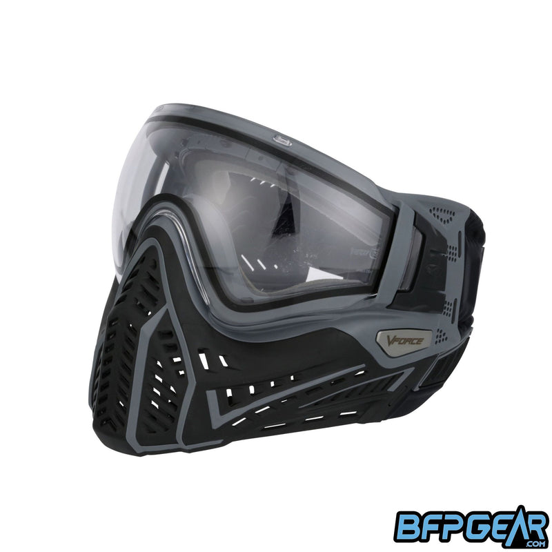 Left facing angled shot of the Profiler 2.0 in black and grey. The upgraded ventilation goes along side the goggle, from the cheek to the ear.