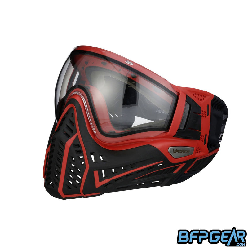 Left facing angled shot of the Profiler 2.0 in black and red. The upgraded ventilation goes along side the goggle, from the cheek to the ear.