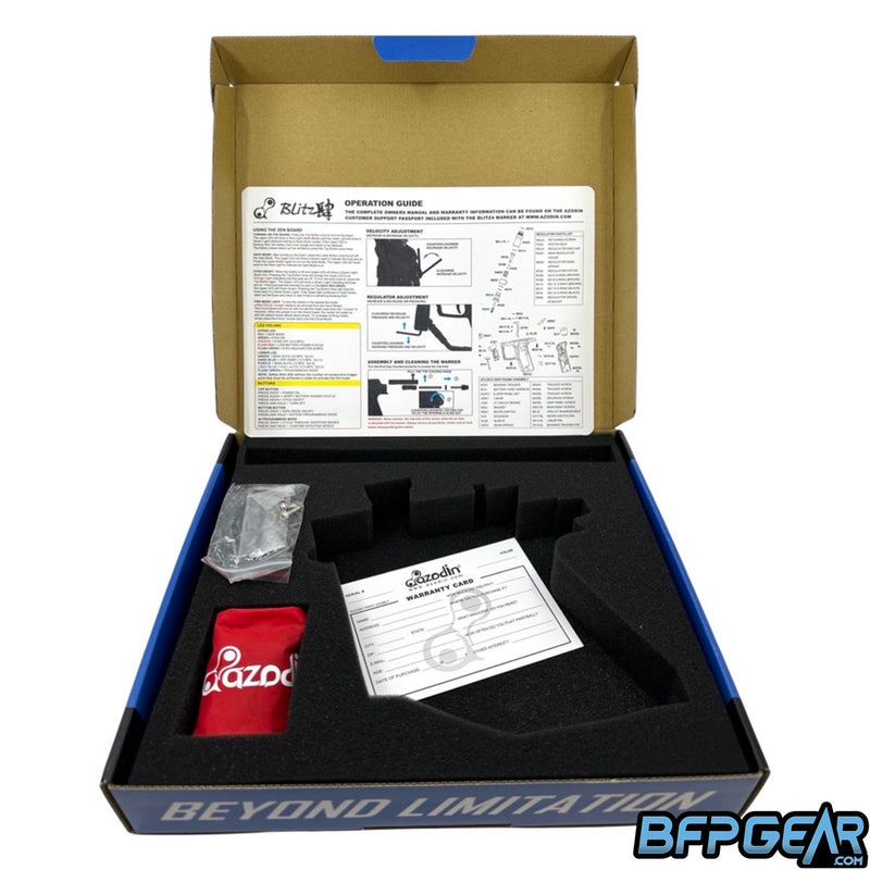 The packaging of the Blitz 4. Cardboard box with a foam insert to hold the marker, warranty card, quick start guide, barrel sock, Allen keys and spare parts are all included.