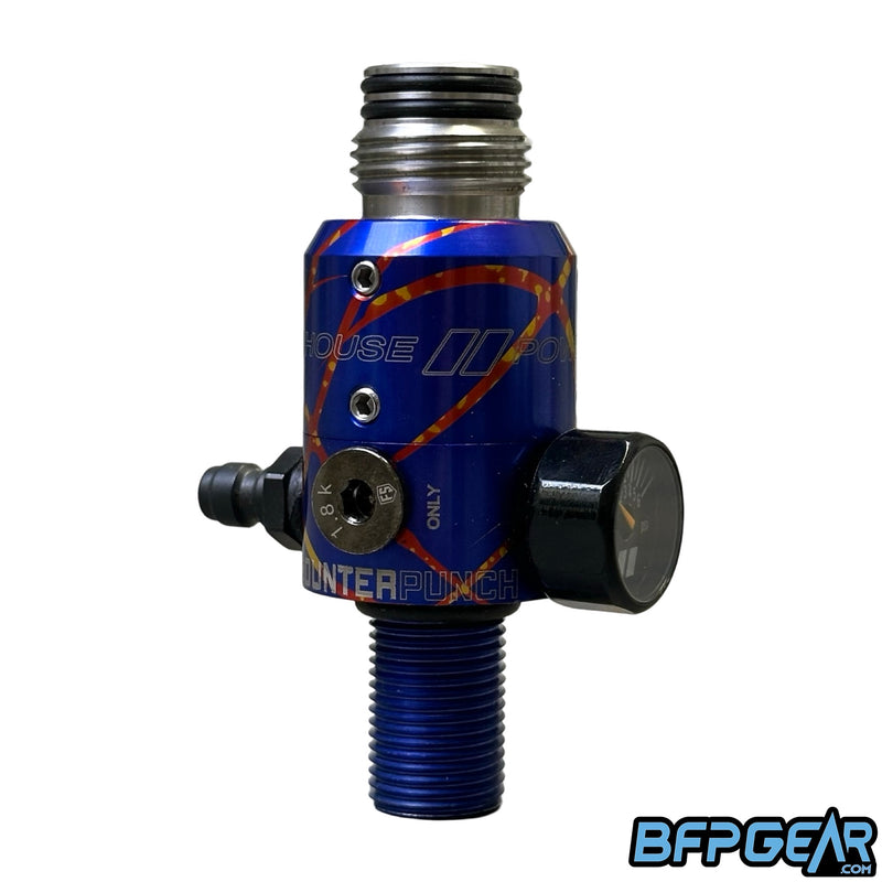 The Powerhouse Counterpunch regulator in the cosmic splash color way. Blue, orange, and gold splash anno.