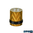 The Fossil nipple cover in gold.