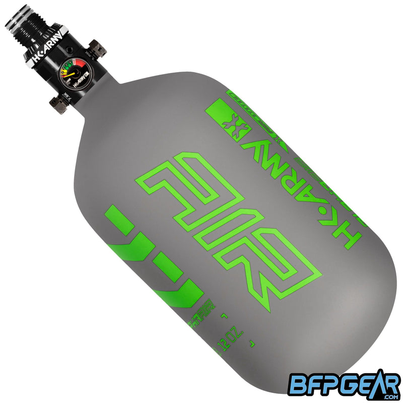 The HK Army Alpha Air 77ci air tank with the HP8 regulator in the Toxic pattern. The bottle is grey and neon green.