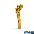 The HK Army Etha2/Etha3 trigger in gold, reaper style. This trigger is shaped with a staggered look, giving you an extended point of contact towards the bottom of the trigger.