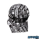 An angled view of the back of the skull cap in the Chaos Black color way. The elastic band secures firmly with velcro, and shows off an HK Army tag on the back. The mesh lining goes from the apex of the back of your head down over your neck for the best ventilation. The retro pattern goes all around the elastic band.