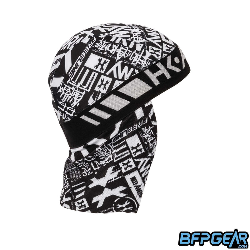 Side view of the Skull Cap in the Chaos Black color way. Mesh lining drapes down the back of the neck to help keep you warm in the cold weather, or to block the sun during hot weather. Elastic band to keep the skull cap secured on you for minimal to zero movement. The elastic band is all black.