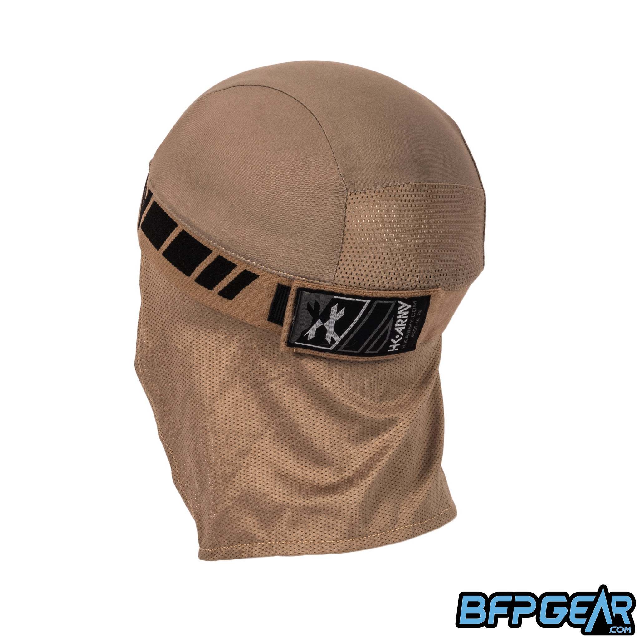 An angled view of the back of the skull cap in the Dune color way. The elastic band secures firmly with velcro, and shows off an HK Army tag on the back. The mesh lining goes from the apex of the back of your head down over your neck for the best ventilation. The retro pattern goes all around the elastic band.