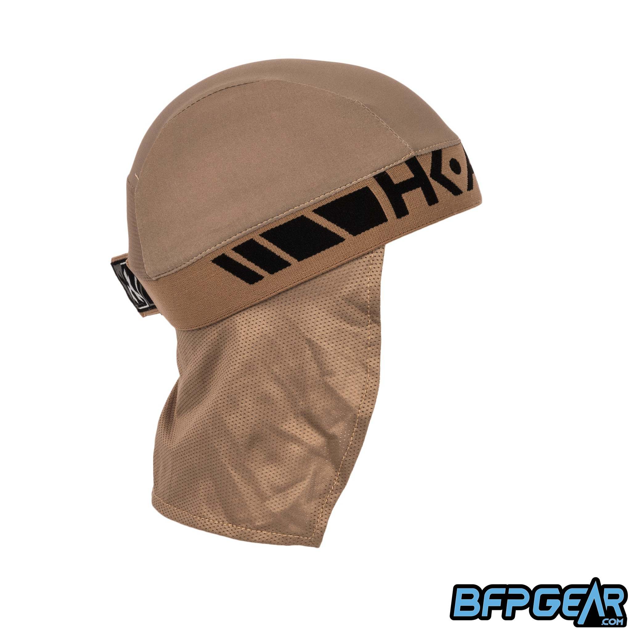 Side view of the Skull Cap in the Dune colorway. Mesh lining drapes down the back of the neck to help keep you warm in the cold weather, or to block the sun during hot weather. Elastic band to keep the skull cap secured on you for minimal to zero movement. The elastic band is all black.