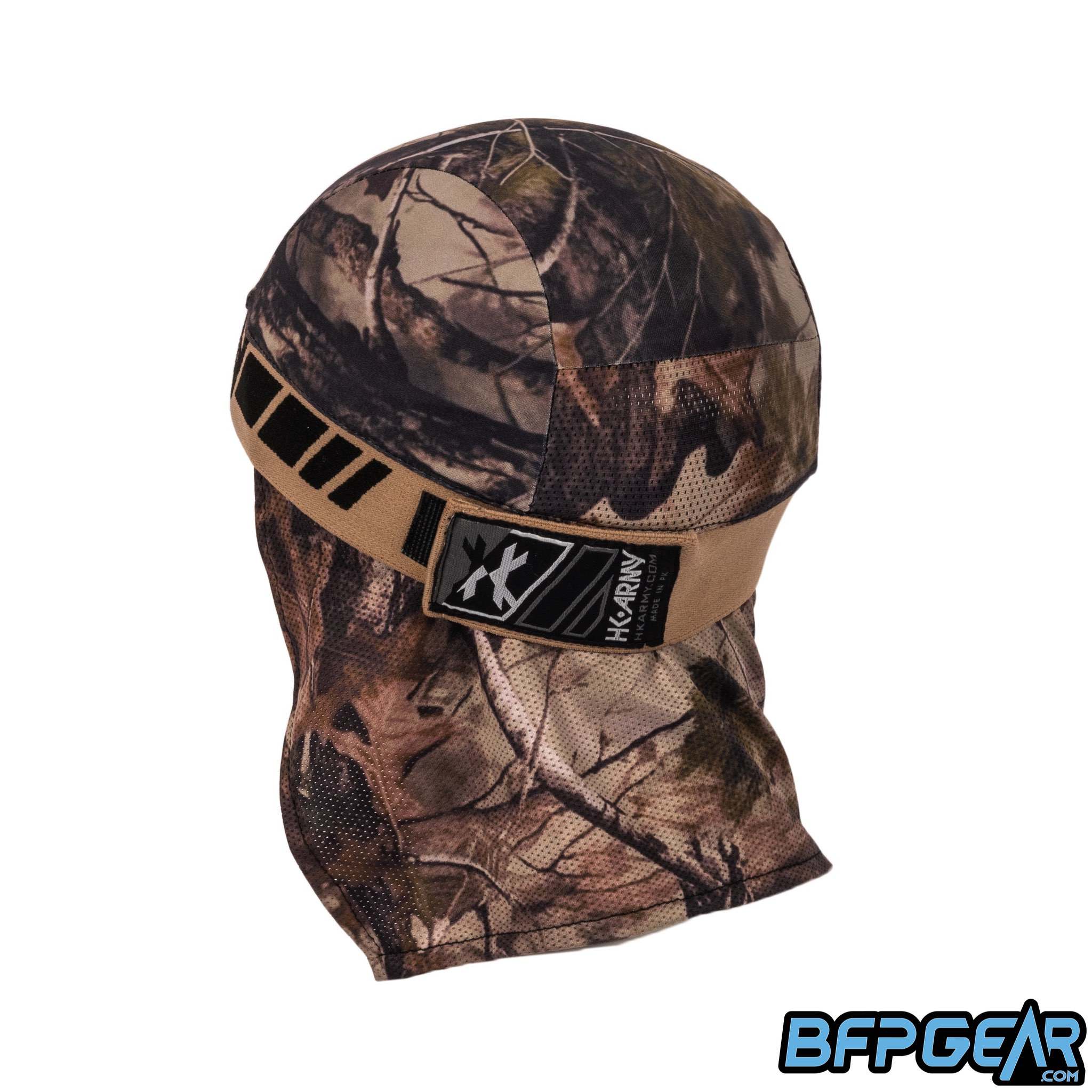 An angled view of the back of the skull cap in the Forest color way. The elastic band secures firmly with velcro, and shows off an HK Army tag on the back. The mesh lining goes from the apex of the back of your head down over your neck for the best ventilation. The retro pattern goes all around the elastic band.