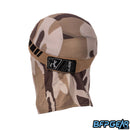 An angled view of the back of the skull cap in the Sandstorm color way. The elastic band secures firmly with velcro, and shows off an HK Army tag on the back. The mesh lining goes from the apex of the back of your head down over your neck for the best ventilation. The retro pattern goes all around the elastic band.