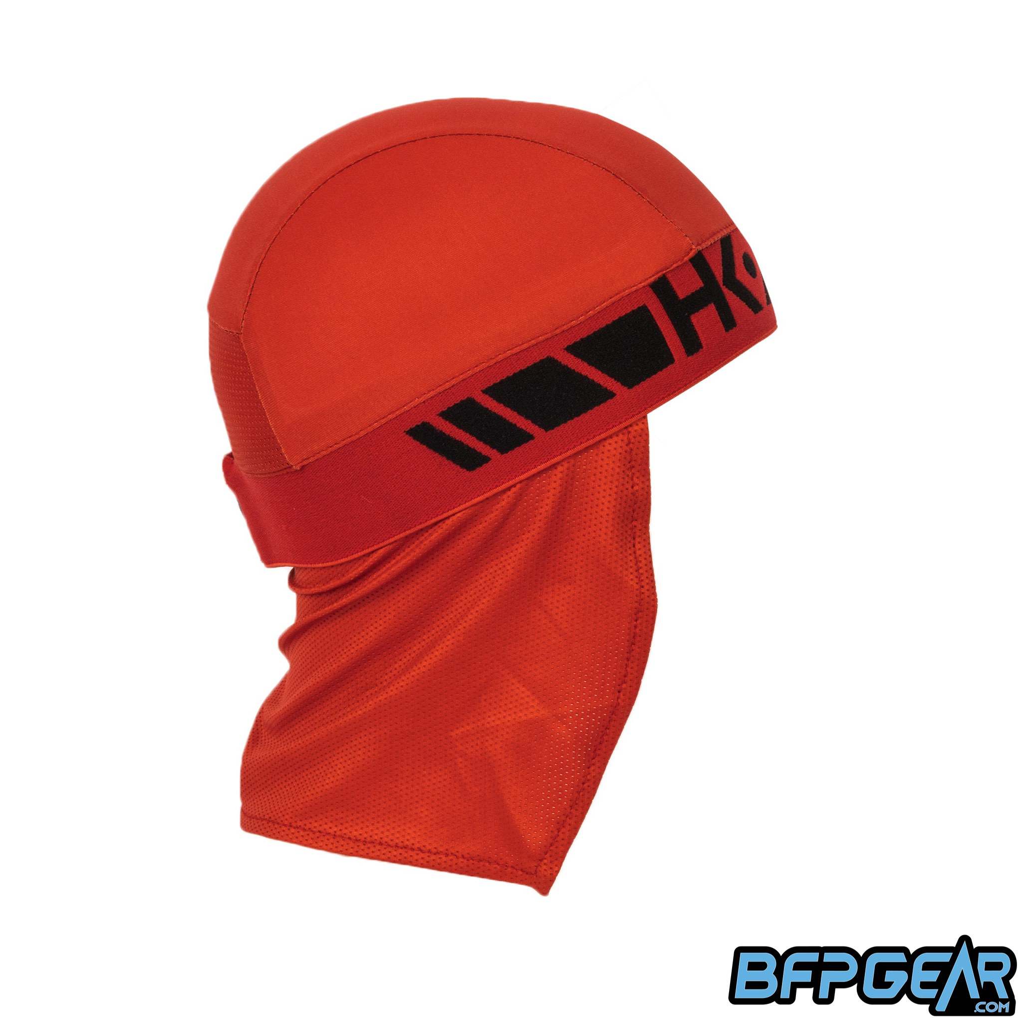 Side view of the Skull Cap in the Scorch color way. Mesh lining drapes down the back of the neck to help keep you warm in the cold weather, or to block the sun during hot weather. Elastic band to keep the skull cap secured on you for minimal to zero movement. The elastic band is all black.