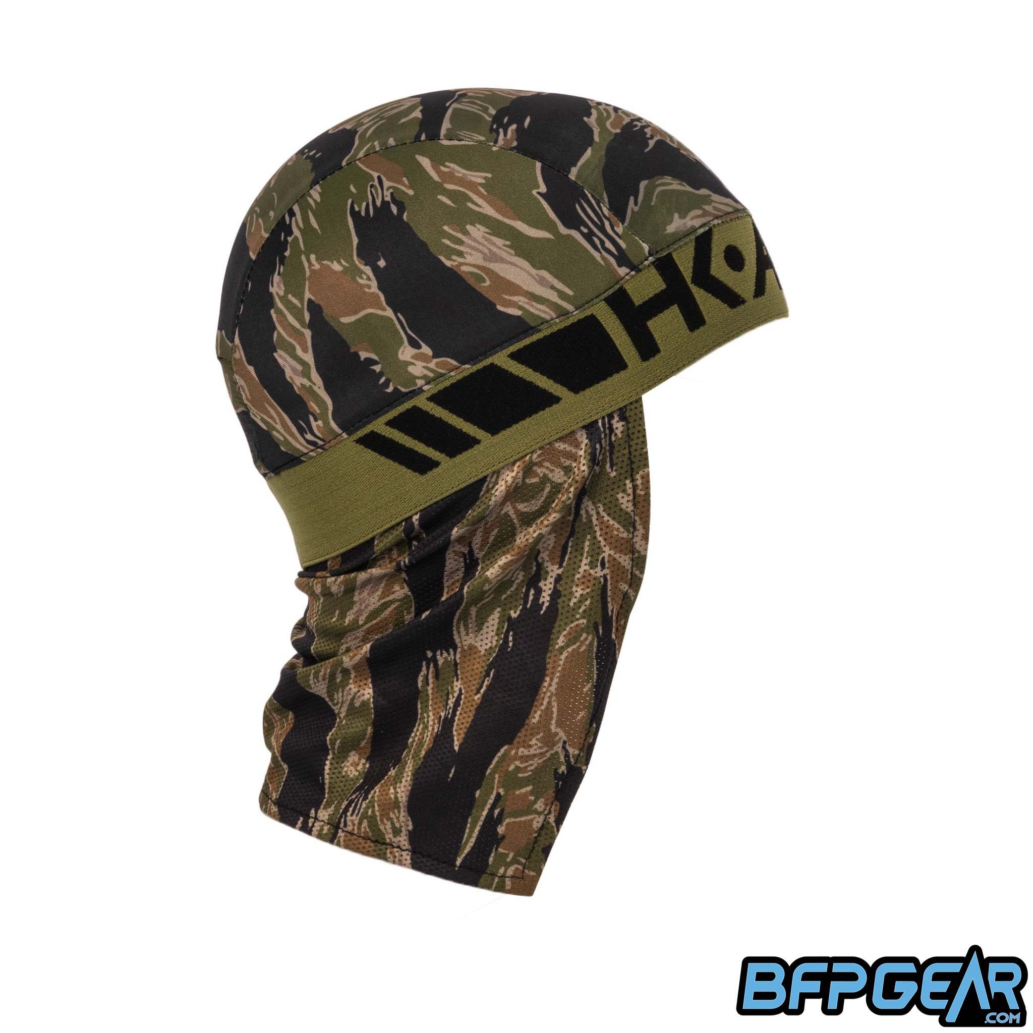 Side view of the Skull Cap in the Tigerstripe color way. Mesh lining drapes down the back of the neck to help keep you warm in the cold weather, or to block the sun during hot weather. Elastic band to keep the skull cap secured on you for minimal to zero movement. The elastic band is all black.