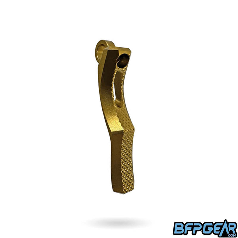 The Haptic Deuce trigger in gold.