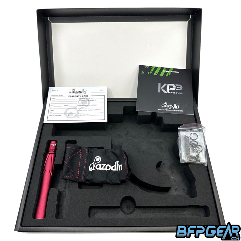 The packaging of the KP3 Pump. Cardboard box with a foam insert to hold the marker, warranty card, user manual, extra .681 barrel back, barrel sock, Allen keys and spare parts are all included.