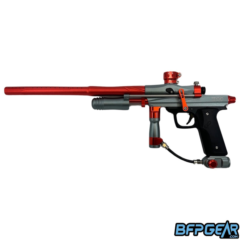 The KPC+ Pump paintball gun in grey and orange.