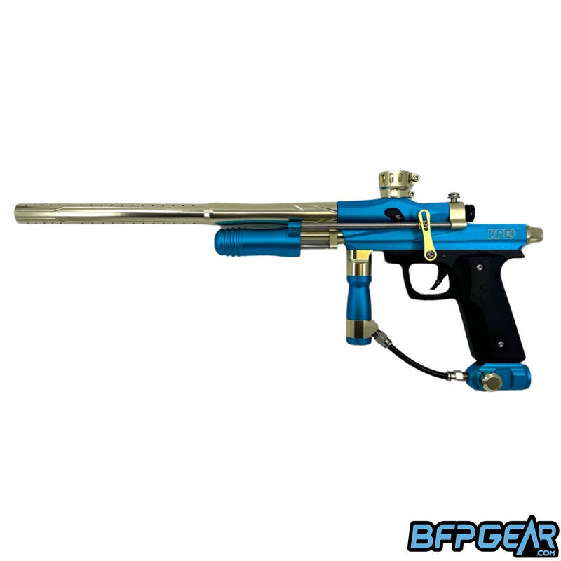 The KPC+ Pump paintball gun in teal and gold