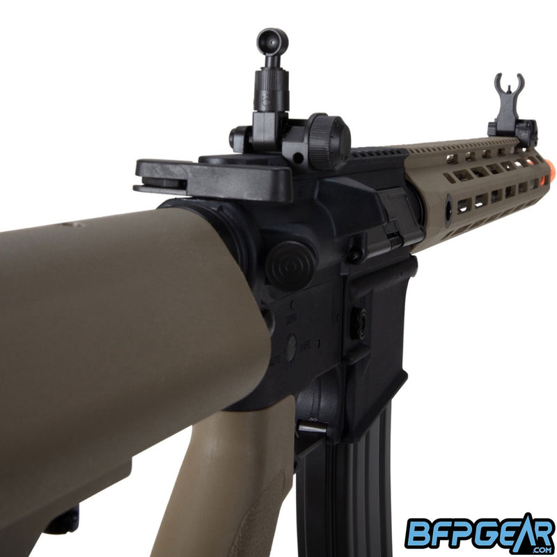 The Elite Force M4 CFR comes with flip up iron sights and an adjustable stock.