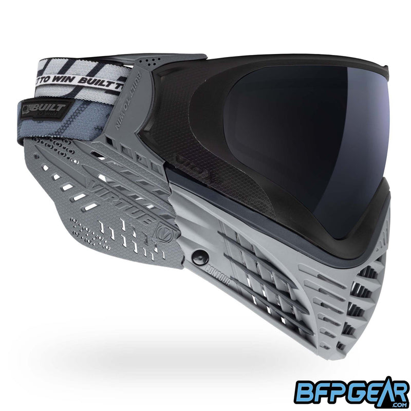 A custom color way of the Vio X6 Black Storm goggle system. Grey faceplate with black accents and grey soft ears.