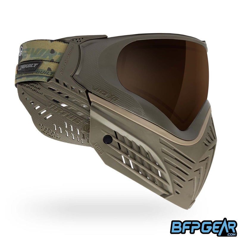 A custom color way of the Vio X6 Desert Storm goggle system. Extended olive faceplate with tan accents and olive soft ears.