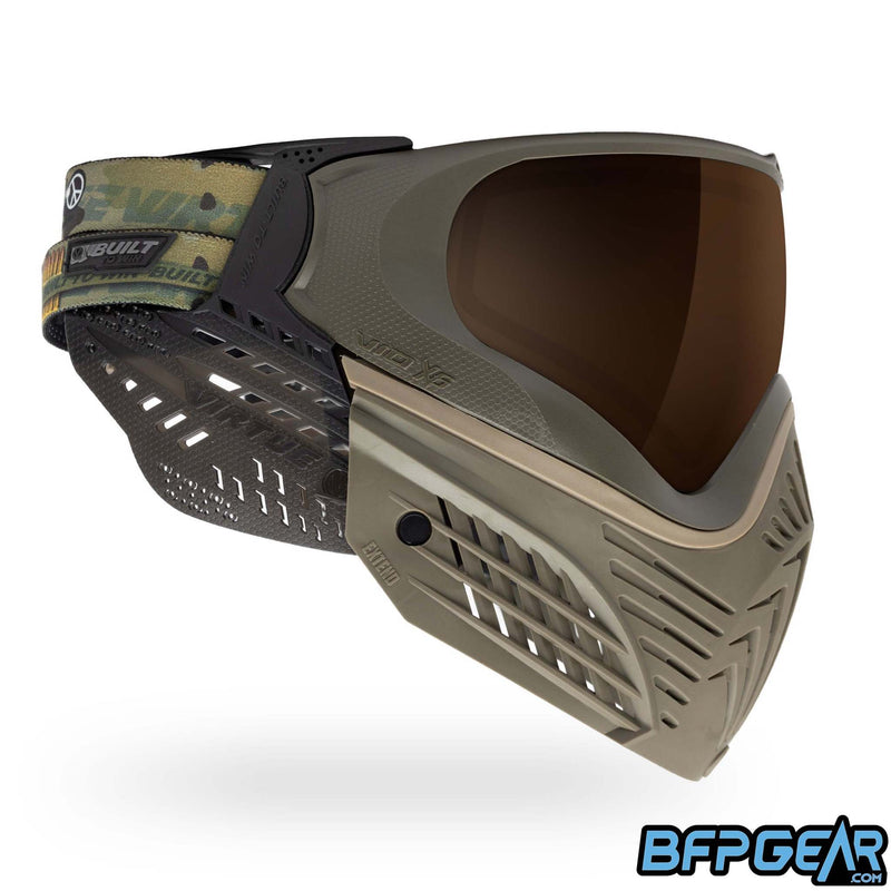 A custom color way of the Vio X6 Desert Storm goggle system. Extended olive faceplate with tan accents and smoke soft ears.