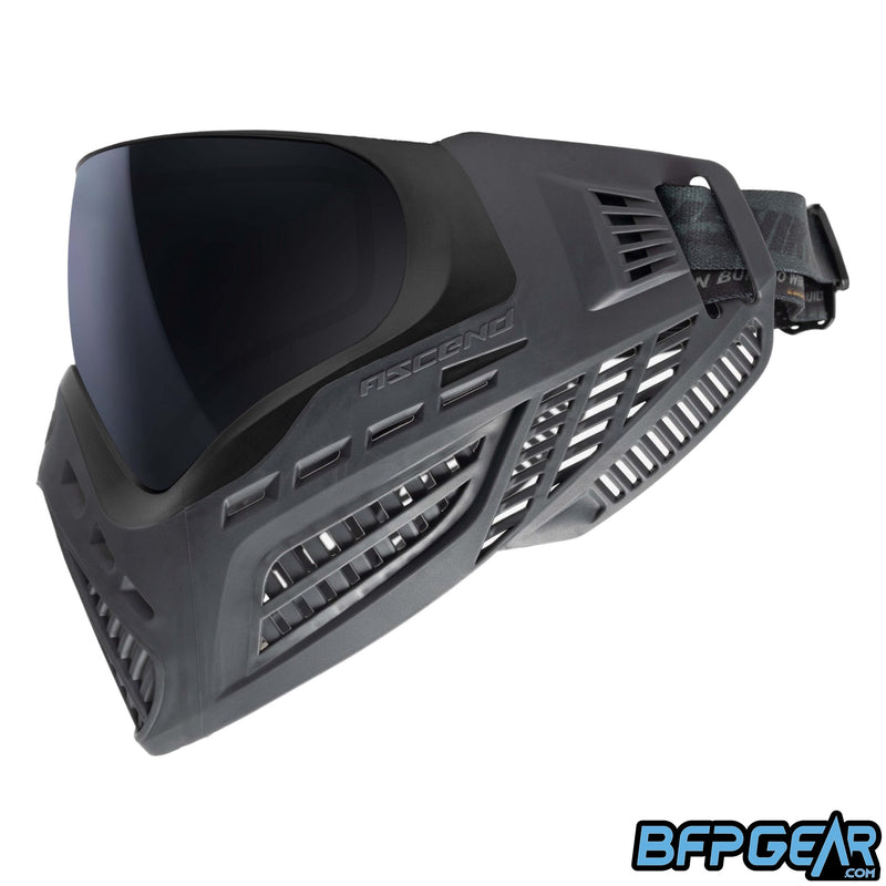 The Vio Ascend SE Doodoo FDE facing left. These special edition goggles come with the 4-point strap, triple layered foam, and is a solid two-tone black and gray color.