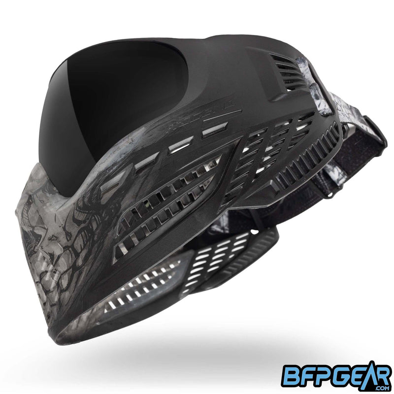 An angled view of the Virtue VIO Ascend Clear Skull LE goggles. This angle shows off the ventilation along the side of the goggle.