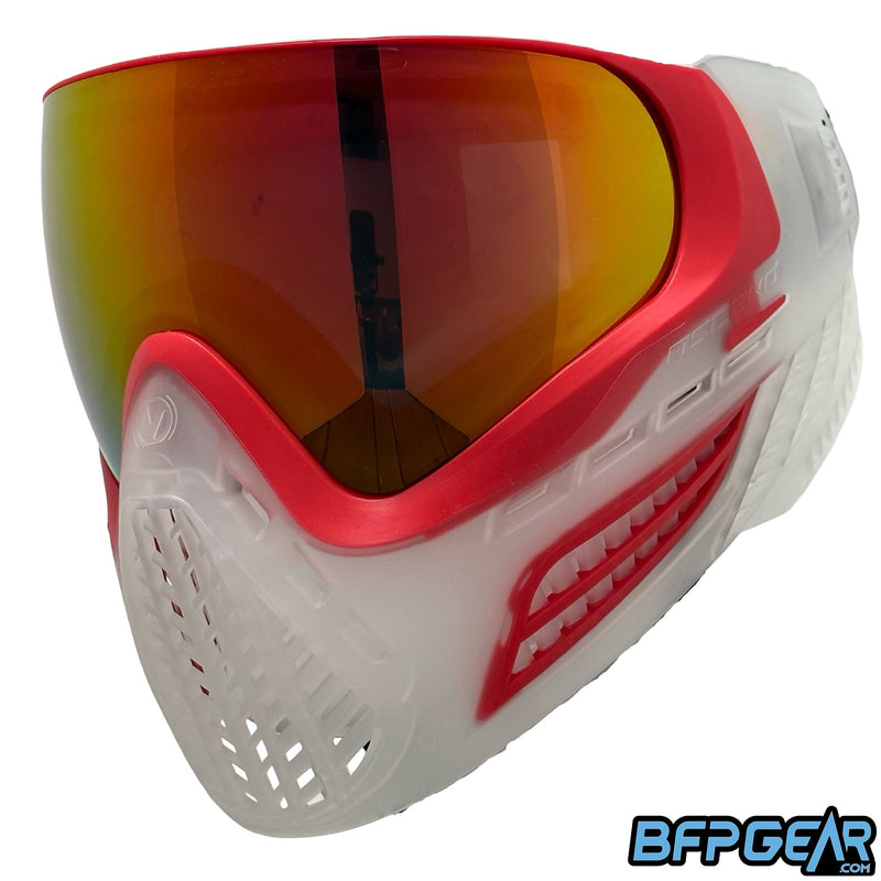 The Virtue VIO Ascend goggle in the crystal red color way, facing the left. This angle shows off some of the side ventilation the goggle offers.