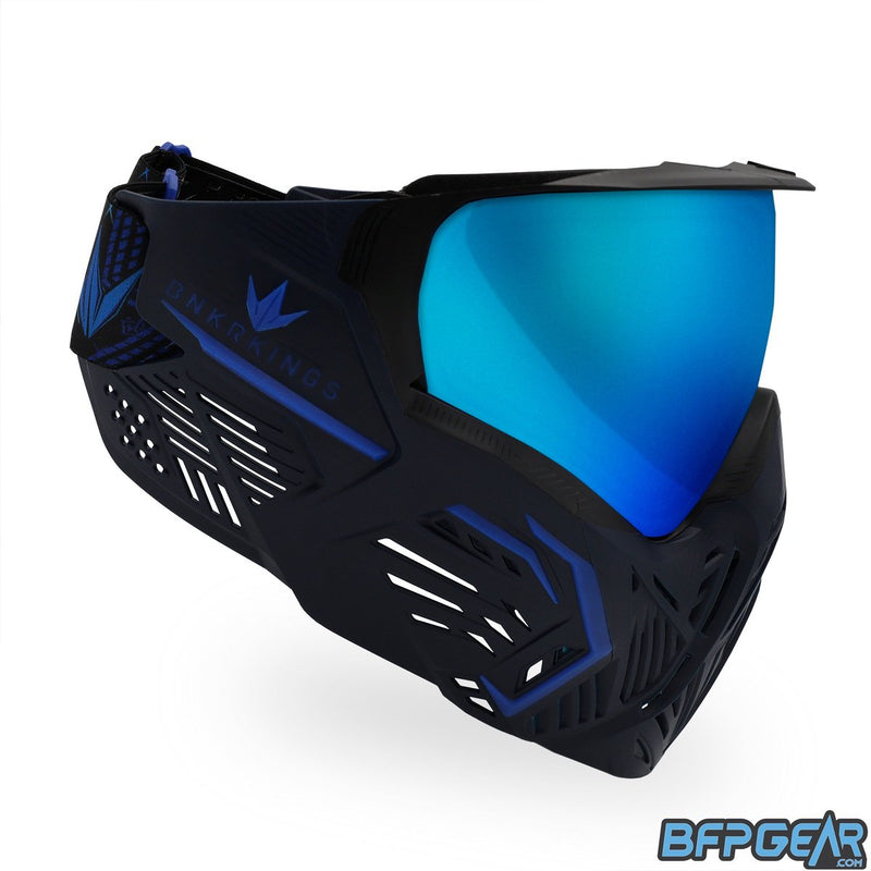 A side view of the CMD goggle. The CMD goggles have a mini visor attached and lots of ventilation near the ears, making it easier to hear your teammates.