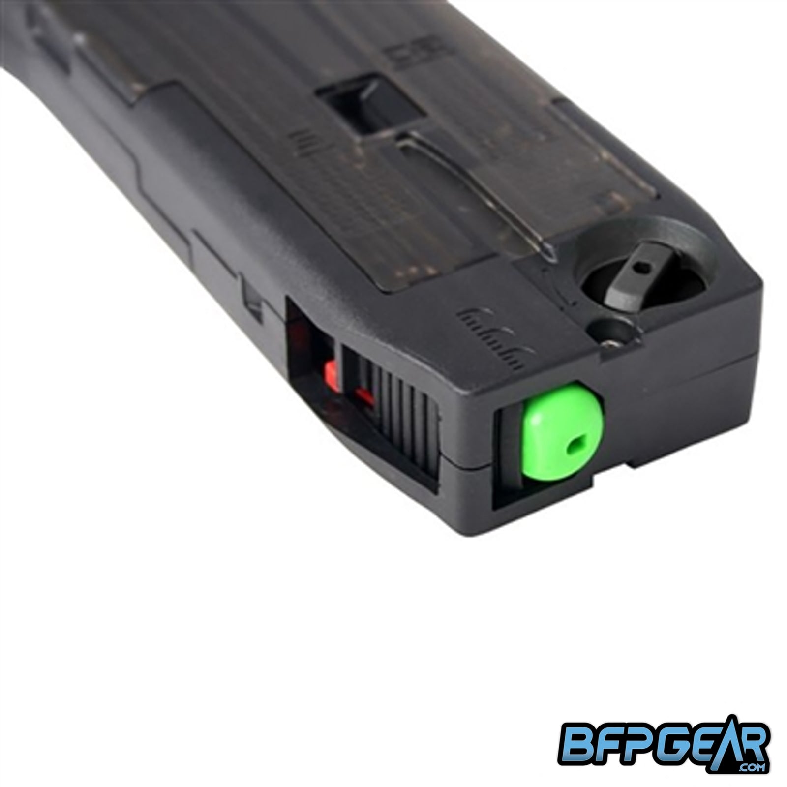 Pictured here is the green piston that pushes the paintball from the magazine into your marker.