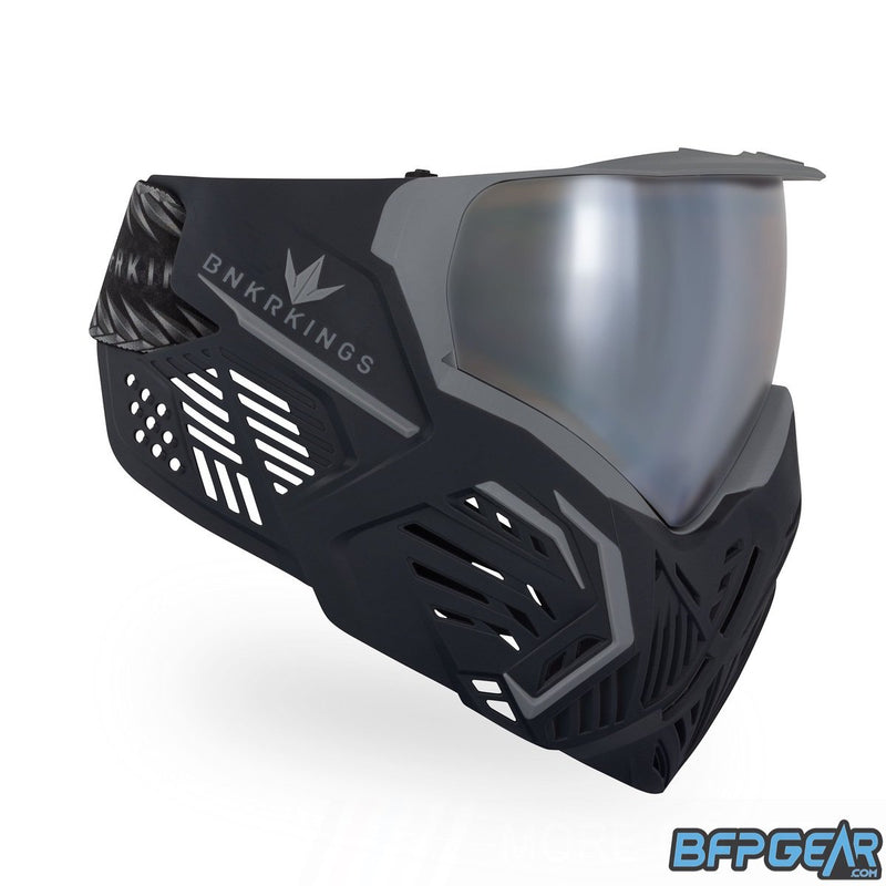 A side view of the CMD goggle. The CMD goggles have a mini visor attached and lots of ventilation near the ears, making it easier to hear your teammates.