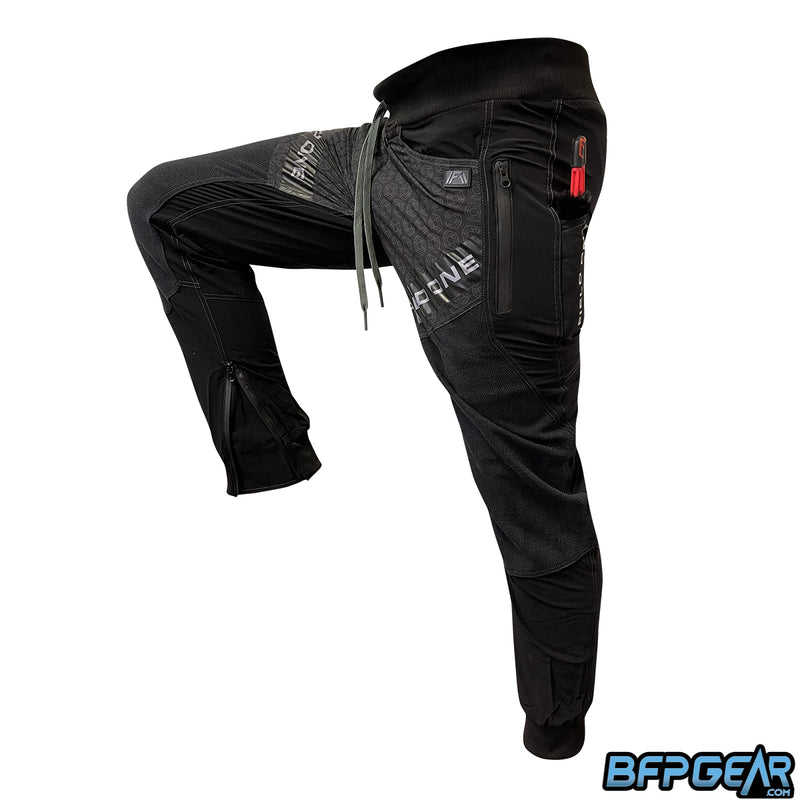 Field One Guard Pant with right leg up showing exceptional range of motion