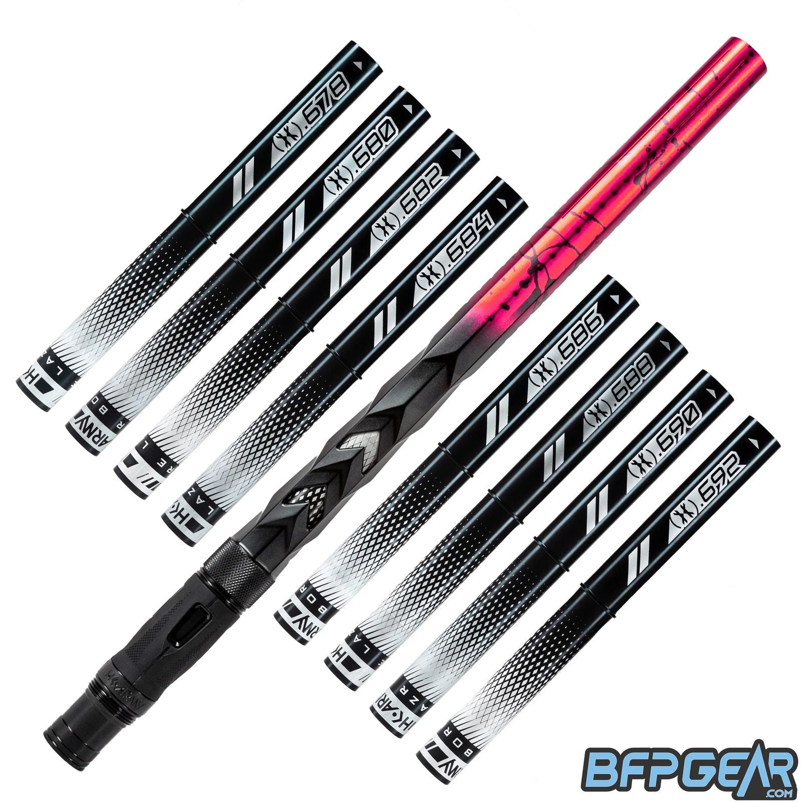 8 black inserts and the Fossil barrel are shown. The Fossil barrel has a unique pattern, the back of the barrel has been milled to look and feel like scales half way the barrel. The front of the barrel has linear porting, both holes and slits. The barrel is black and fades to red with black splash.