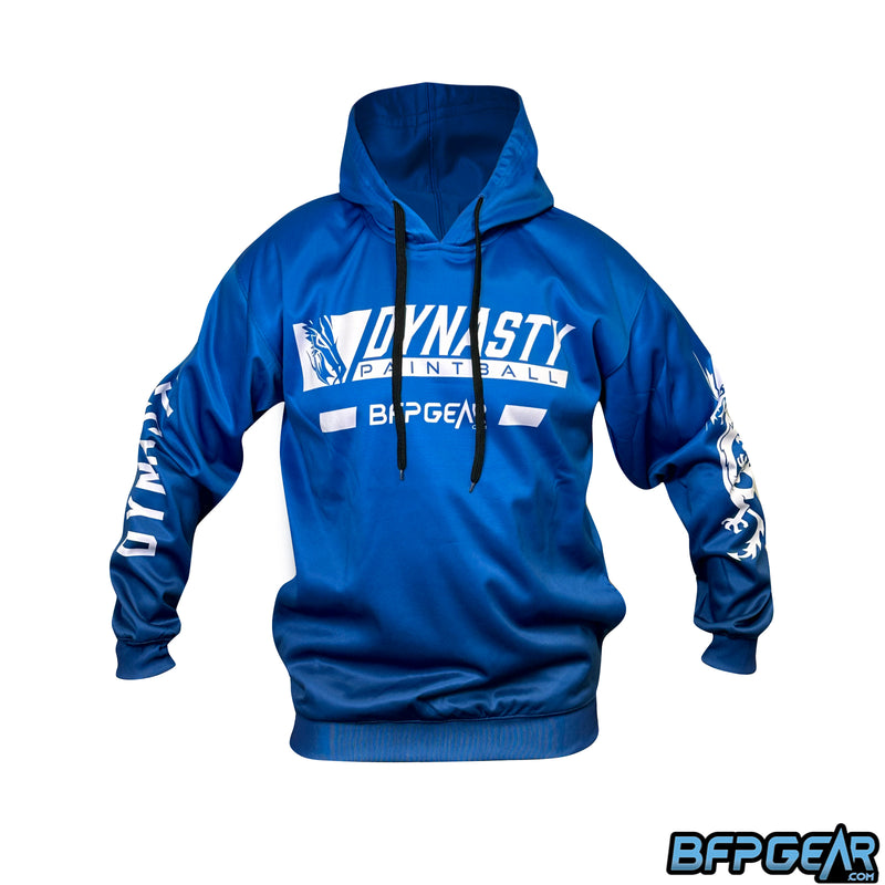 The JT Custom Pull Over Hoodie, Dynasty Dragon design. All blue with a sheen, has two black drawstrings for the hood, and has Dynasty Paintball on the front with the Dynasty Dragon logo on the front and right left sleeve. The right sleeve reads out Dynasty.