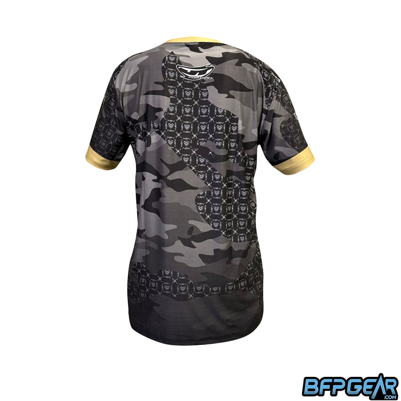 Back of the XSV 23 stretchy soft shirt. Gold sleeve cuffs and neck cuff with a mix of dark camo and a symmetrical XSV pattern all over.