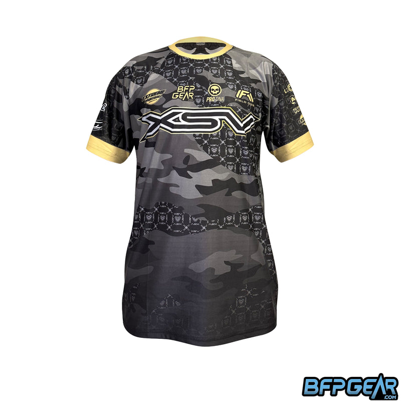 The XSV 23 stretchy soft shirt. Gold sleeve cuffs and neck cuff with a mix of dark camo and a symmetrical XSV pattern all over.