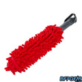 A photo of the HK Army pod swab in red. The fuzzy microfiber end is red, and the handle is dark grey with a black spray cap.