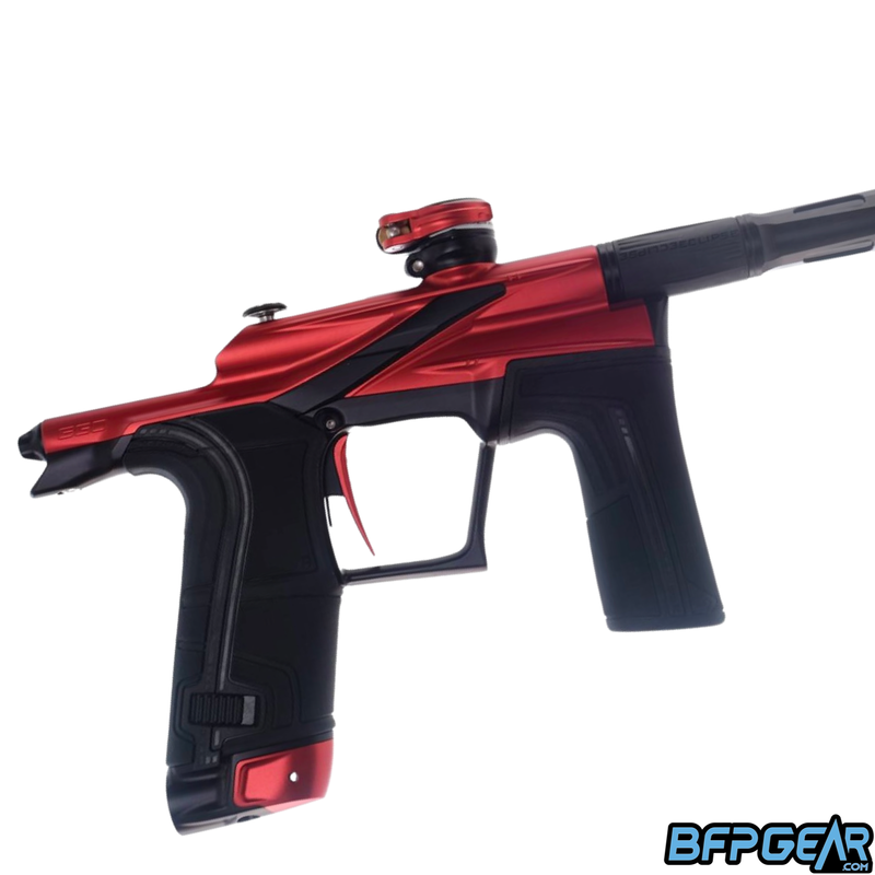 close up of a red and black eclipse lv2 paintball marker